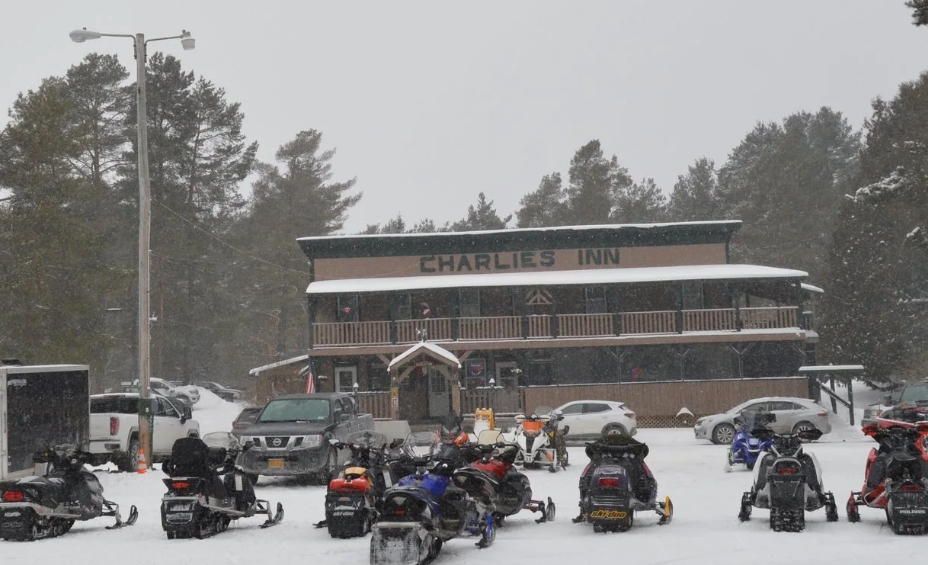 Snowmobile to Charlie's Inn